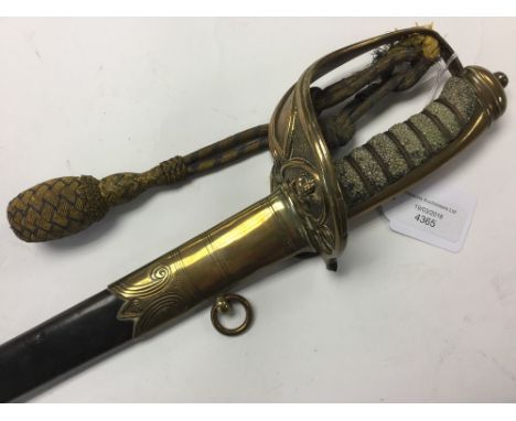 British Victorian Royal Navy Officers Sword. 76cm long etched "VR" blade marked "Bennets, 11 Castle St. Leicester Square, Lon