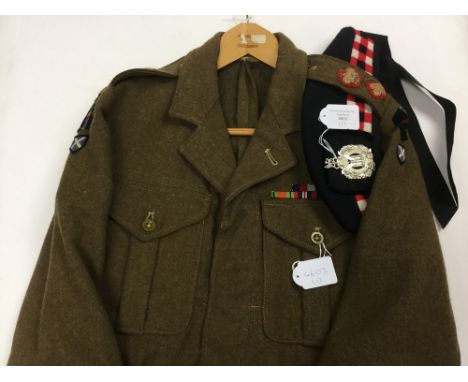 British 1949 Pattern Battledress Blouse, Size 8 by Clarence Clothing Co, Belfast dated 1953. Complete with all original insig