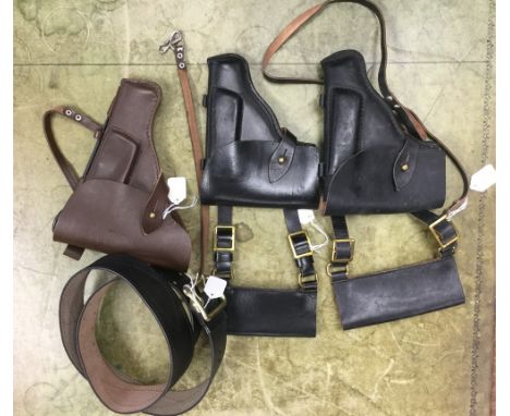 A collection of Soviet Pistol Holsters: one Red Army issue Tokarev TT33 holster in brown leather complete with cleaning rod: 