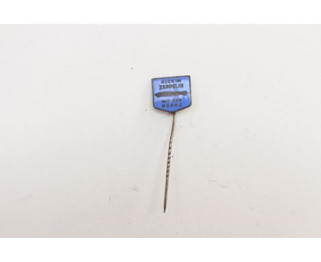 Third Reich era stick pin in blue enamel "Auch im Zeppelin mit der HAPAG". Has correct twisted fluting to the stick pin. No m