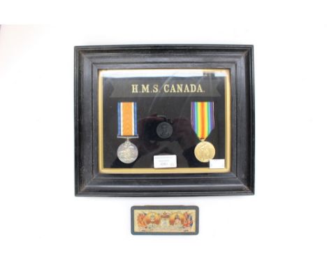 WW1 British Medals to a member of the Royal Navy. British War Medal and Victory Medal to 0 74105 A Benson RN. In period frame