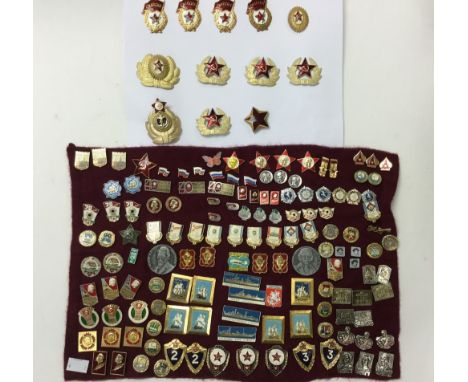 A collection of over 100 Soviet patriotic pins, Soviet Army Guards badges x 4, Officers and OR's cap badges x 7 and excellent