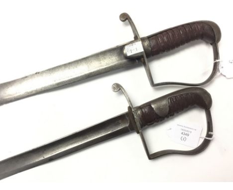 A pair of Victorian swords. Both without scabbards. First has 80cm single edged blade with several nicks to edge. Victorian C