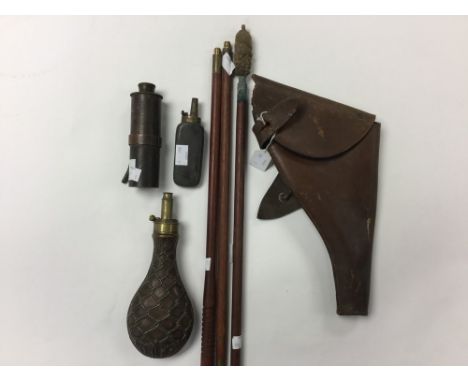 Copper powder flask; together with one other and a 1918 dated British leather holster marked "RW Stiby"and three part cleanin