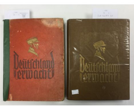WW2 Third Reich cigarette card books "Deutschland Erwacht". Two editions. The first has red cover with green spine and is inc
