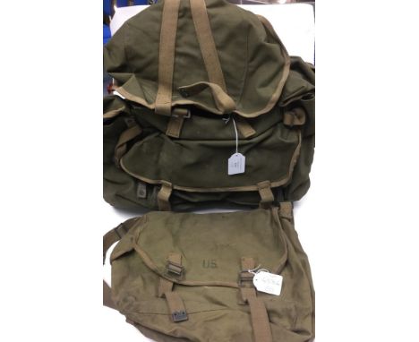 WW2 British Bergan Rucksack. Dark green. Dated 1944. Along with a British made US Army M1936 Musette bag. Maker marked "MECo"