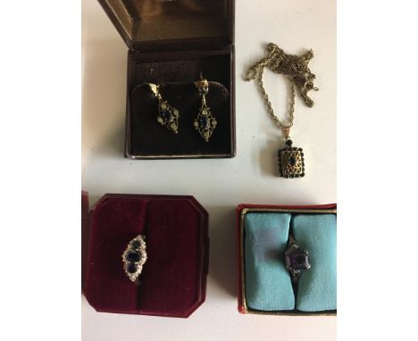 Sapphire ring, earrings, necklace and gold ring
