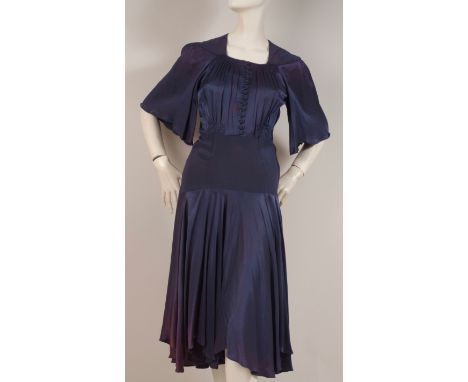 A 1970'S 'ALICE POLLOCK' CREPE DRESS Blue/mauve heavy crepe dress. Shirred and pleated bodice with pretty covered buttons fas