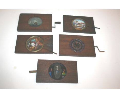 MAGIC LANTERN & SLIDES including 5 early wooden framed slides with winding handles or levers, makers include Robinson of Dubl