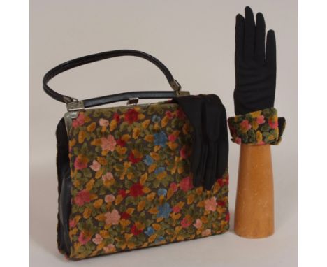 A COLLECTION OF VINTAGE HANDBAGS Interesting collection of bags from the 1950's. To include a lucite bag, blonde crocodile ba