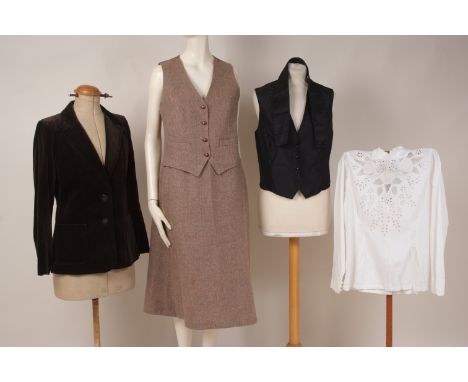 A COLLECTION OF VINTAGE 1970'S CLOTHES A tweed skirt and waistcoat labelled 'country casuals'. Size 12. A black waistcoat and