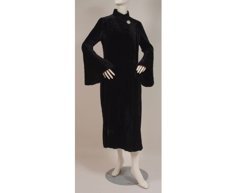 A VINTAGE BLACK VELVET EVENING COAT Elegant and feminine evening coat, soft black velvet with flared sleeves quilted from the