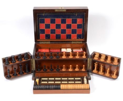 ANTIQUE GAMES COMPENDIUM a Rosewood cased Games Compendium, including a boxwood and ebony Chess Set, Draughts, Dominoes, Crib