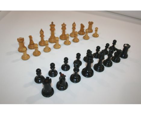 STAUNTON BOXED CHESS SET a boxwood wooden chess set, with the Knight's and Rook's marked with a red crown. In a mahogany box,