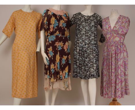 A COLLECTION OF VINTAGE FLORAL DRESSES A 1940's Black voile dress with blue and pink flowers, drop waist with front pleats, l