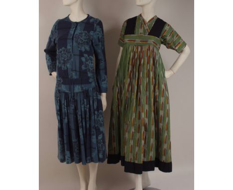 TWO CIRCA 1975 'KENZO JAP' DRESSES A pinafore dress with black cotton straps over a cotton crossover blouse. Green and black 