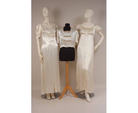 TWO VINTAGE SATIN TEA GOWNS WITH BLOUSE A white satin gown with empire line, pretty scooped back and fastened at the side wit