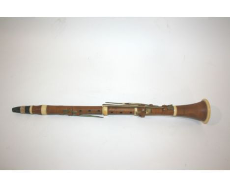 19THC WOODEN CLARINET - GOULDING & CO a boxwood clarinet with ivory mounts, in 5 sections each section stamped Goulding & Co.