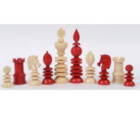 19THC INDIAN IVORY CHESS SET an ivory and stained ivory chess set (complete), probably Indian in origin and in a small mahoga