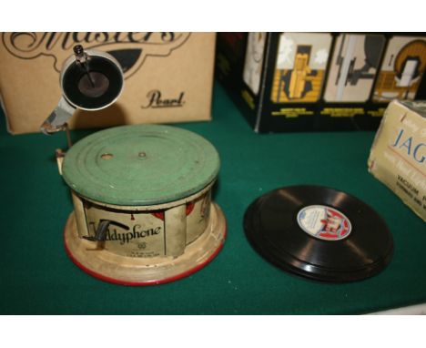 BING 'KIDDYPHONE' CHILD'S RECORD PLAYER a tin plate child's record player the Kiddyphone, with a stylus and 4 records (no hor