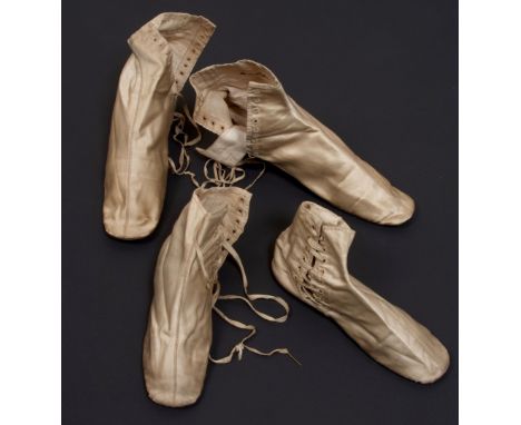 TWO PAIRS OF HAND MADE C19TH  SATIN SHOES Cream satin shoes with leather soles, heel, button holing for lacing at the sides. 