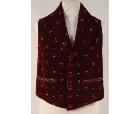 A C19TH VELVET EMBROIDERED WAISTCOAT. Deep wine red velvet with metal embroidered flowers and leaves.  Five velvet covered fr