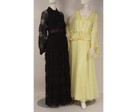 TWO 1970'S 'JEAN VARON' DRESSES An early black cotton lace dress with full ballooned sleeves, wide collar, buttoned at the fr