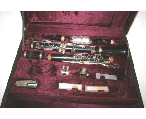 BUFFET CRAMPON CASED CLARINET the wooden clarinet in 5 sections, with two mouthpieces and accessories. Each section marked, B