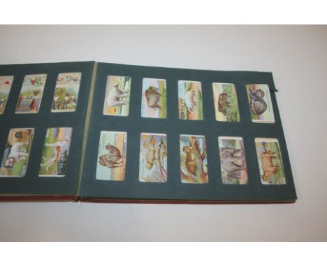 LARGE QTY OF CIGARETTE CARDS in 9 albums, including Wills Coronation Series, Wills First Aid, Wills Signalling Series, Wills 