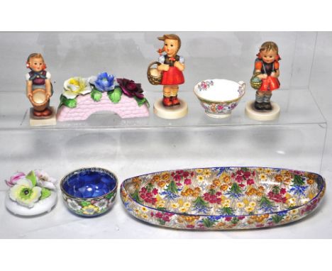 A small quantity of ceramics to include Hummel Goebel figures, a Maling lustre bowl, a Royal Winton "Marguerite" pattern dish