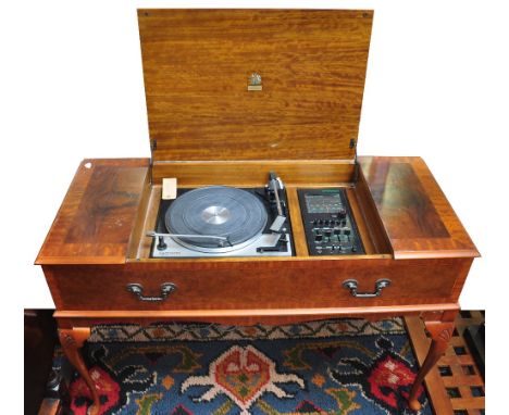 A late 1960s vintage Dynatron stereo radiogram in reproduction case on cabriole legs and fitted with integral speakers, lengt