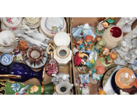 Two boxes of ceramics to include Hummel style figures and various teaware.