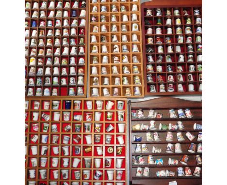 Approximately 500 collectors thimbles to include Royal Worcester, Royal Albert, display cases and some original boxes.