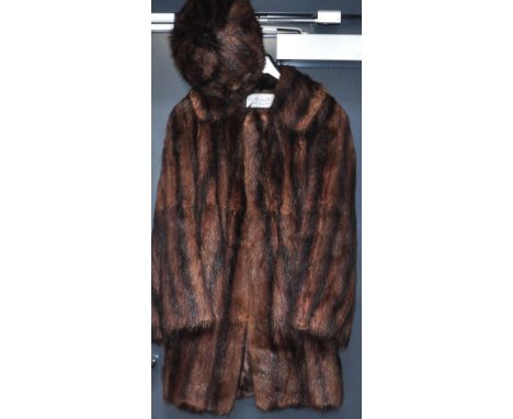 A ladies vintage half-length musquash fur coat retailed by Browns of Chester and a boxed gents bowler hat (2).