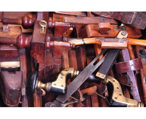 A quantity of good vintage tools to include 13 profiling planes, smoothing planes, router planes and a brass bound ebonised b