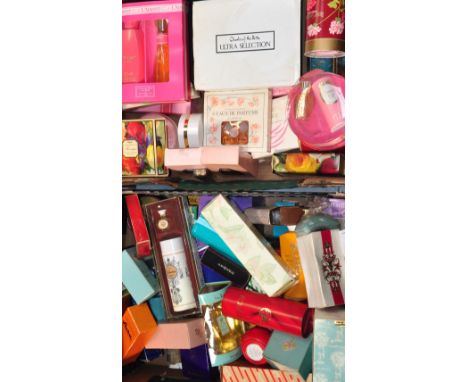 Two boxes containing a large quantity of toiletries and vintage perfumes to include Coty "L'iamant", Madame Rochas, Hartnell 
