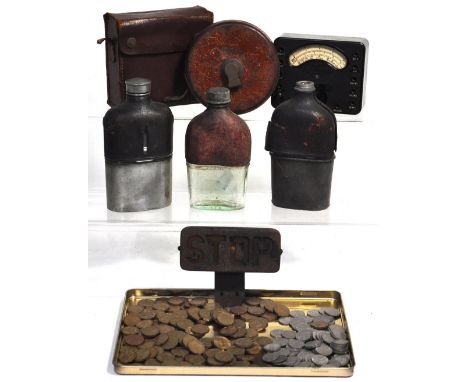 A mixed lot to include three hip flasks, a quantity of 20th century coinage, a vintage tape measure and an automotive stop la