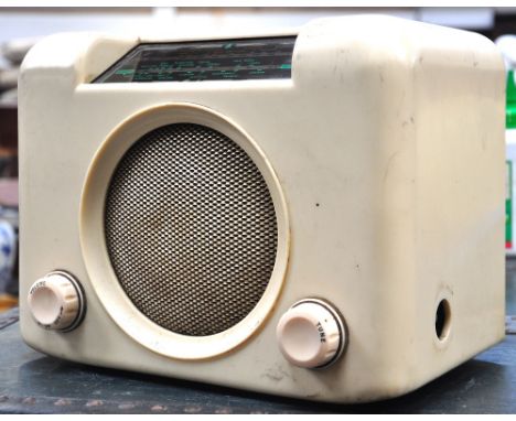 A vintage cream Bush radio serial no 73/172443.