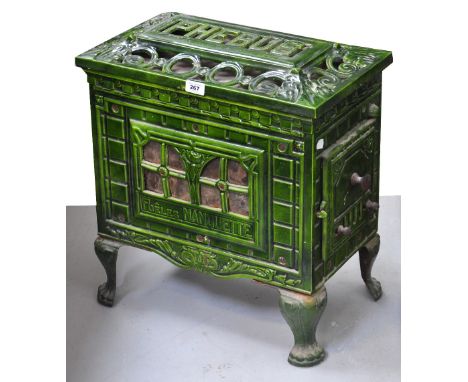 An early 20th century Phebus green enamel stove on cabriole supports, height 55cm.