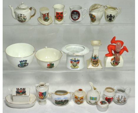 Eighteen items of Crested ware to include Goss and Carlton ware.