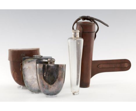 A GEORGE V SILVER MOUNTED GLASS HUNTING FLASK bayonet cap, 34cm h, by Hubert Hall, Chester 1924, leather saddle case and a Vi