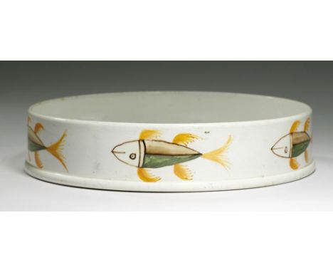 A PRATT WARE CHAR DISH, C1820 the sides painted with five fish in brown, yellow ochre and green, 22.5cm diam A similar, sligh