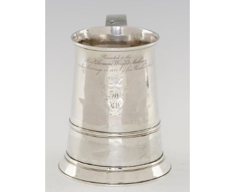 A GEORGE III SILVER MUG  engraved with crest, initials and inscription Presented to the Revd Thomas Wright Mathews on his Mar