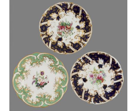 A ROCKINGHAM C SCROLL MOULDED DESSERT PLATE AND A PAIR OF ENGLISH PORCELAIN PLATES RETAILED IN LONDON BY JOHN THOMAS BRAMELD,