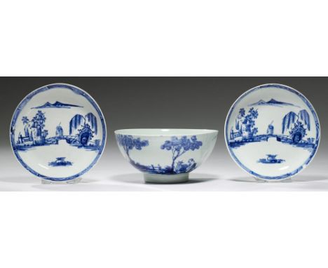 A VAUXHALL BLUE AND WHITE SLOP BOWL AND PAIR OF SAUCERS, C1755-60  the bowl painted in smudged blue with a European view and 