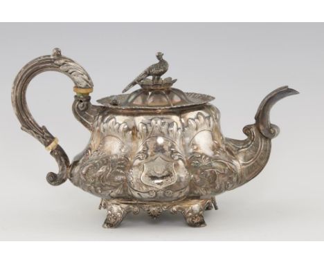 A WILLIAM IV MELON SHAPED SILVER TEAPOT  chased in high relief with panels of birds, pheasant  finial, 17.5cm h, maker IW in 