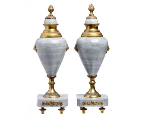 A PAIR OF FRENCH GREY MARBLE URNS with milled or ciselé gilt bronze mounts, c1900, 29cm h++Minor nicks around the base, gildi