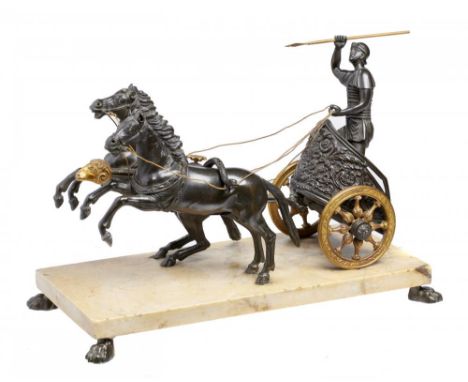 A PARCEL GILT BRONZE STATUETTE OF A CHARIOTEER, 19TH/EARLY 20TH C on sienna marble base and bronze paw feet, 22cm h++Some dam