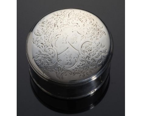 A SILVER FREEDOM BOX AND COVER, PROBABLY IRISH, C1780-90 the slightly domed lid engraved with shield of arms and foliate mant