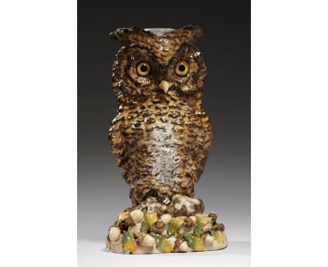 A GERMAN PORCELAIN OWL NOVELTY OIL LAMP, LATE 19TH C  the glass eyed bird perched on a mound of oak leaves and acorns, 25cm  
